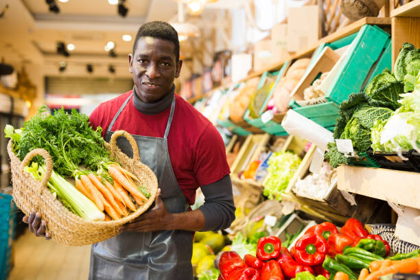 istock Slesman offering carrots and celery 1302822702