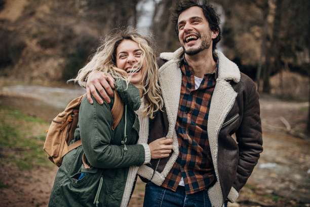 istock Happy couple exploring nature together 1302826633