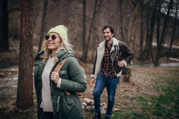 istock Happy couple exploring nature together 1302827906