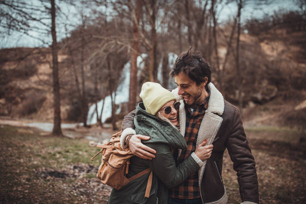 istock Happy couple exploring nature together 1302828488