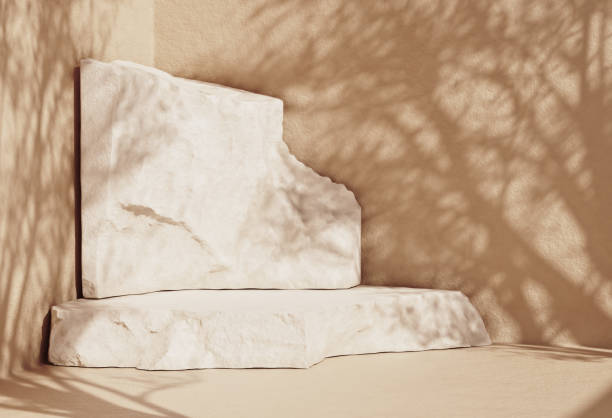 istock Stone slabs cosmetic product podium with shadows on the wall 1302829531