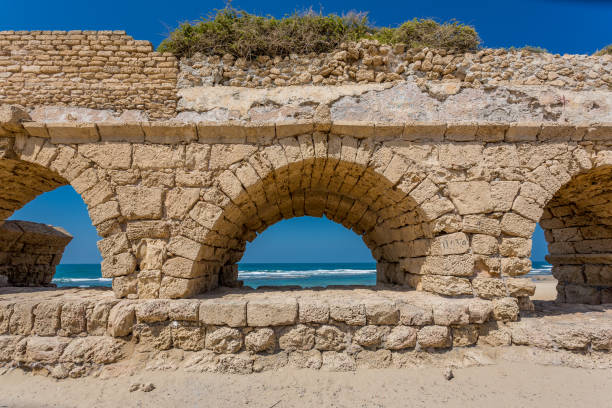 istock Roman aqueduct in Caesarea, Israel 1302829897