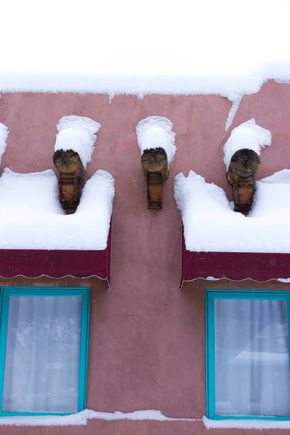 Santa Fe, NM: A traditional adobe building downtown in snowy Santa Fe. Copy space available.