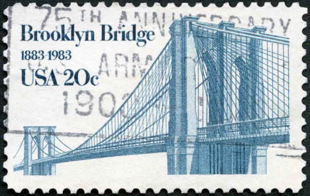 istock Postage stamp printed in USA shows Brooklyn Bridge, 1983 1302833592