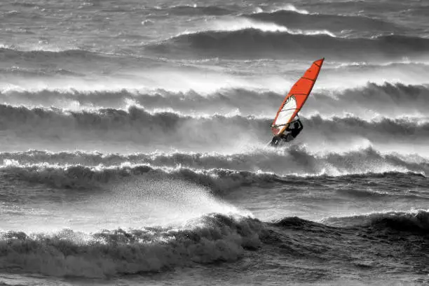 Photo of Red windsurfer