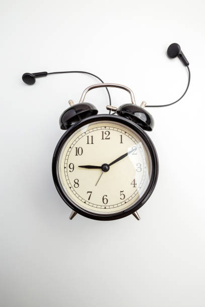 istock Retro alarm clock with headphone 1302834639