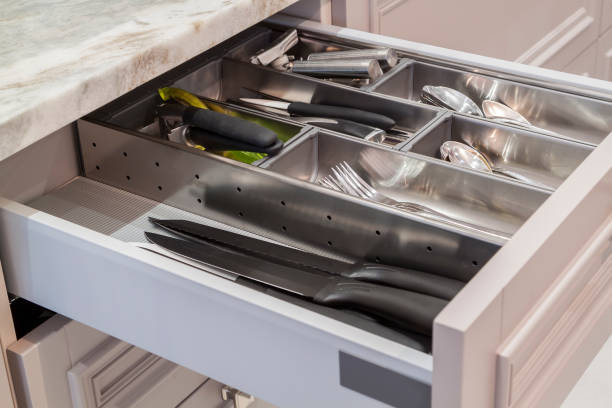 istock Close up view of opened kitchen drawer with cutlery 1302835433
