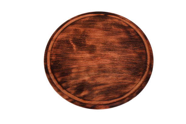 istock Wooden cutting board with copy space. design element, isolated on white background. Wood texture, old wood board. 1302840721