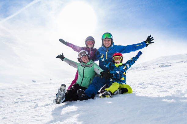 istock Family enjoying ski vacations 1302840890