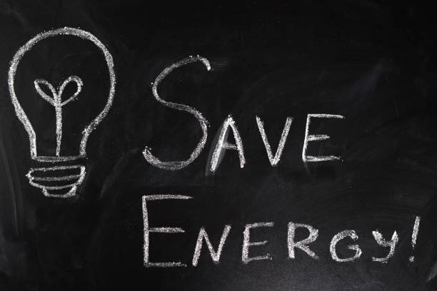 istock save energy, chalk writing on the blackboard 1302841750