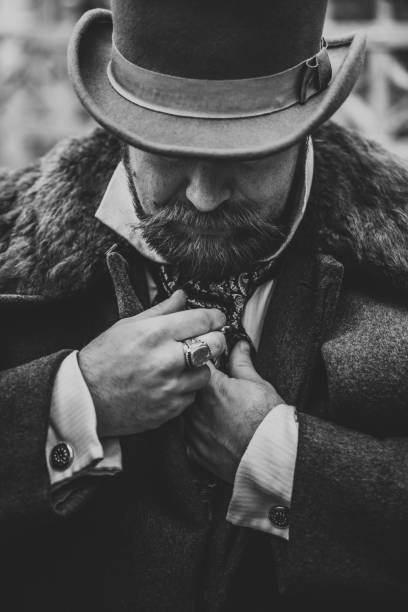 istock Respectable mustachioed man in classic retro clothes, coat and hat. 1302844580
