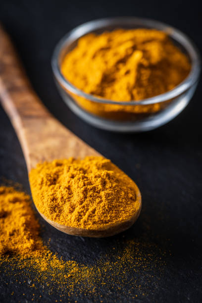 istock Indian turmeric powder. Turmeric spice. Ground turmeric 1302844967