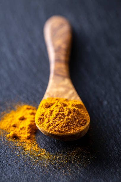 istock Indian turmeric powder. Turmeric spice. Ground turmeric 1302844981