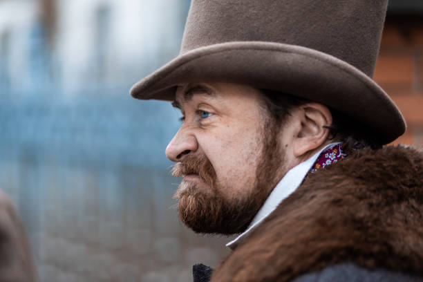 istock Respectable mustachioed man in classic retro clothes, coat and hat. 1302845002