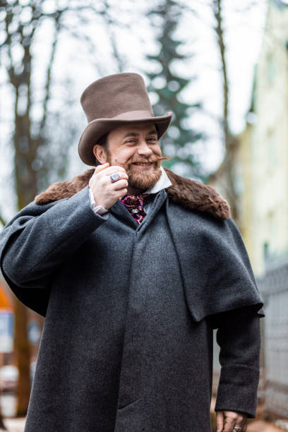 istock Respectable mustachioed man in classic retro clothes, coat and hat. 1302845009