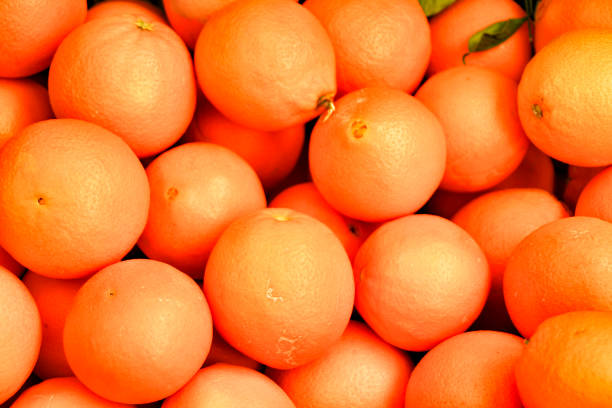 istock Oranges for sale at a market stall 1302845949