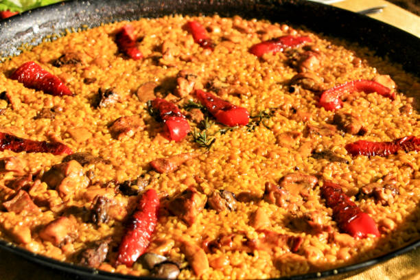 istock Delicious Rice paella with rabbit 1302846139