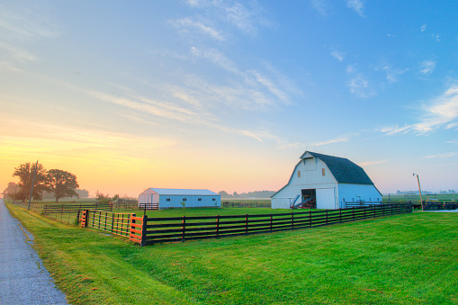 Country road at sunrise-with barn and fence-Howard County, Indiana