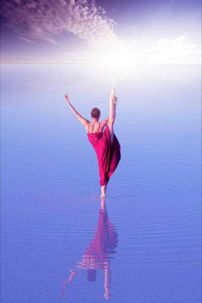istock Ballerina dancing on the lake 1302848943