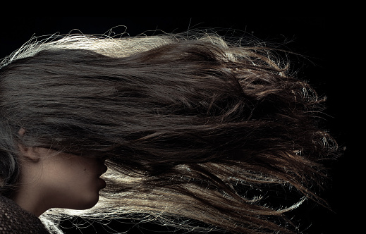 Studio shot of the woman with long hair