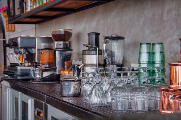 istock Bar counter background with coffee machine and glasses 1302851426