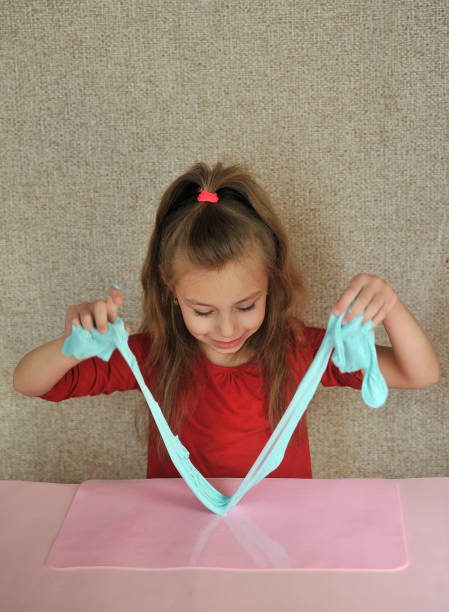 istock Child makes slime at home. 1302853912