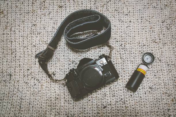 istock Canon AE-1 Program with Film on a Woolen Blanket 1302856999