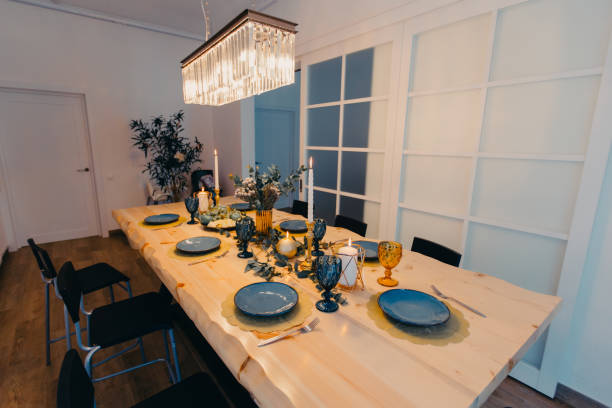 istock Table setting in blue and gold colors. 1302857469