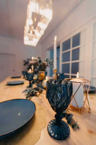 istock Table setting in blue and gold colors. 1302857478