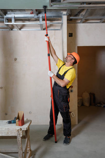 istock Installation of drywall on the ceiling. 1302860461