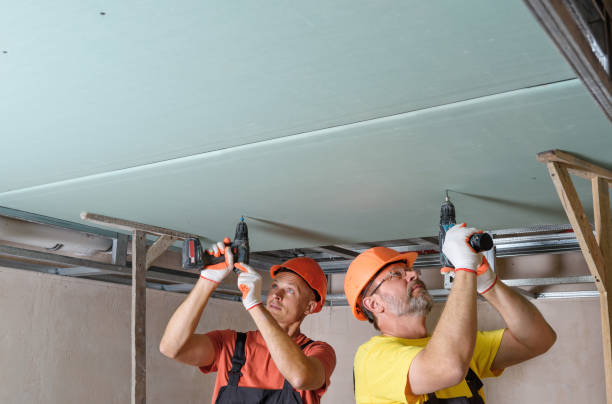 Installation of ceiling drywall.