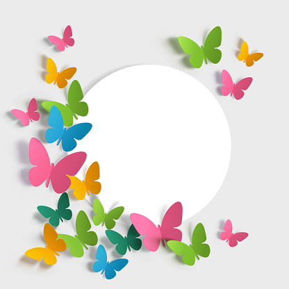 Colorful paper butterflies on white background with blank white note.
