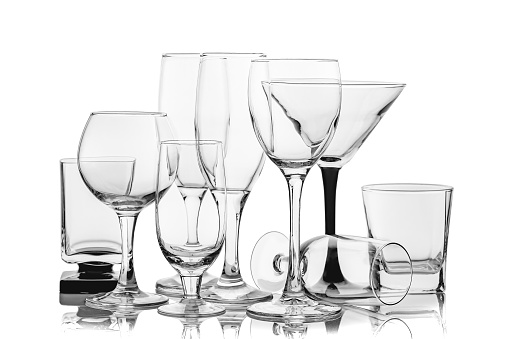 Set of assorted empty wine glasses isolated on white background
