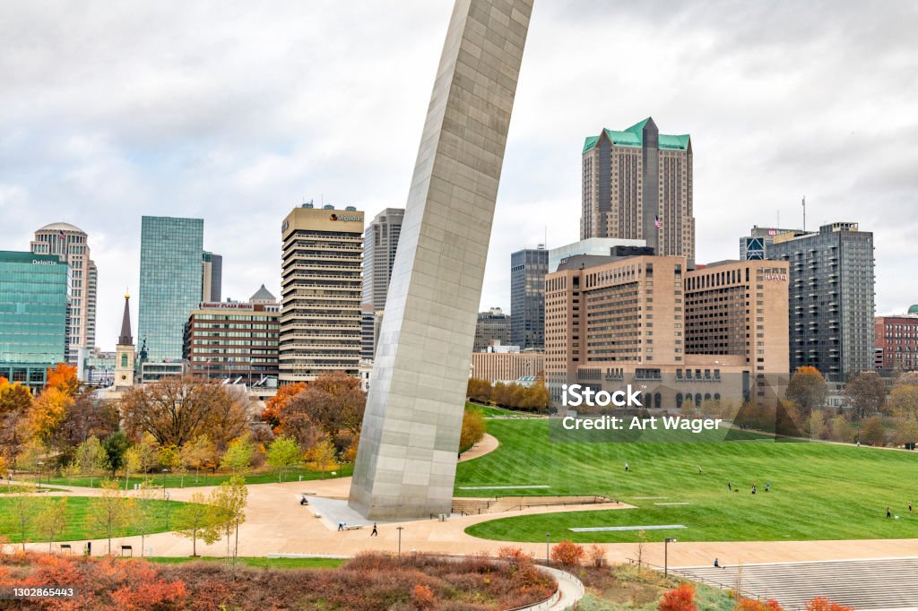 St. Louis's Gateway Arch National Park The Gateway Arch National Park at the base of the famous Gateway to the West with the city of St. Louis beyond. Gateway Arch - St. Louis Stock Photo