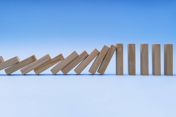 Resisting and Stopping Domino Effect Falls stock photo