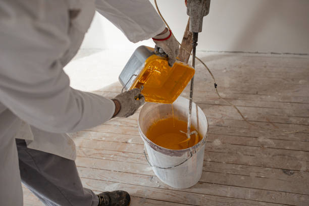 istock Top view of man mixing paint 1302874966