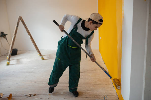 istock Little boy ready to paint walls 1302875775