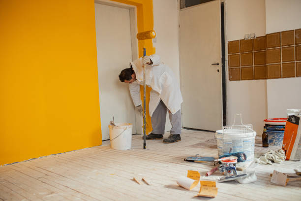 istock Painting walls 1302875959