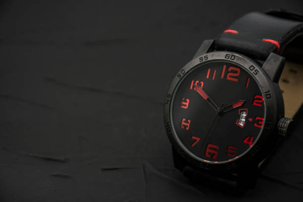 istock Modern wrist watch on black background. 1302882681
