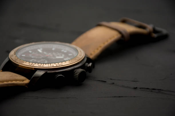 istock Modern wrist watch on black background. 1302882682