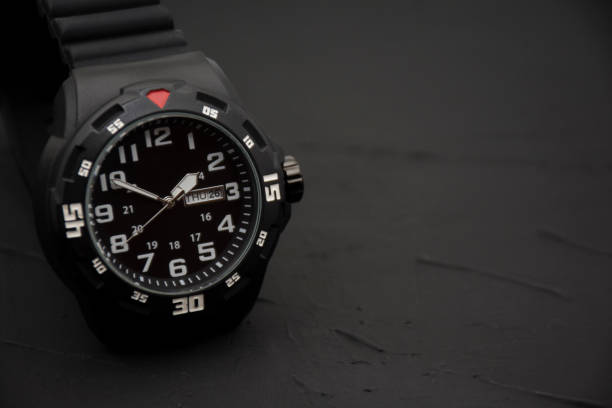 istock Modern wrist watch on black background. 1302882697