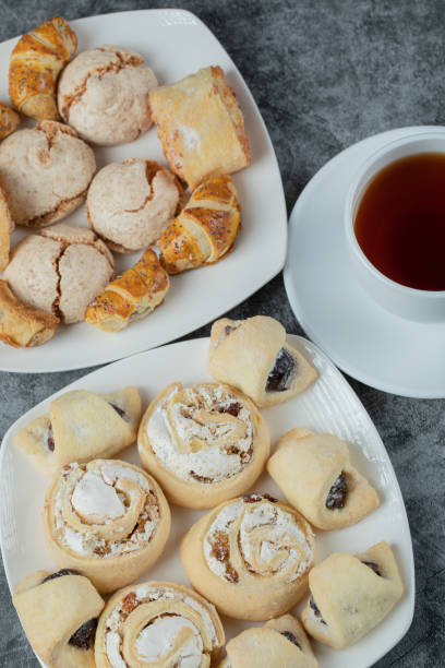 istock Butter cookies served with a cup of tea 1302886786