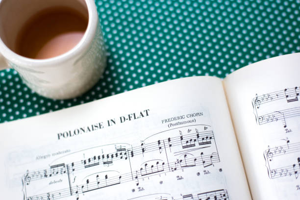 istock Chopin's Sheet Music, Tea Cup, Green Background 1302887686