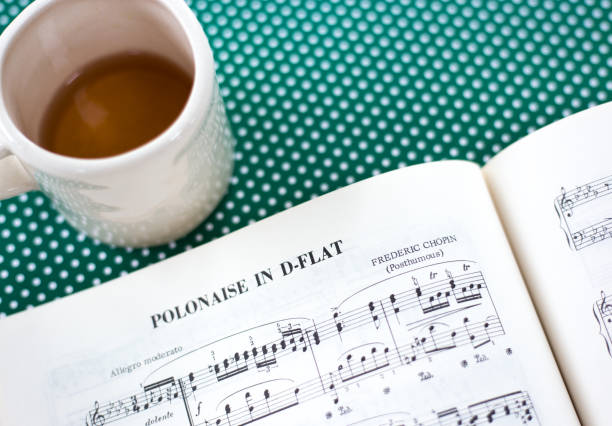 istock Chopin's Sheet Music, Tea Cup, Green Background 1302887703