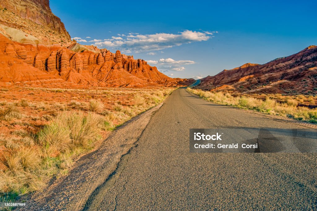 Capitol Reef Scenic Drive road in Capitol Reef National Park with Wingate, Chinle and Moenkopi rock formations. Utah. Capitol Reef National Park Stock Photo