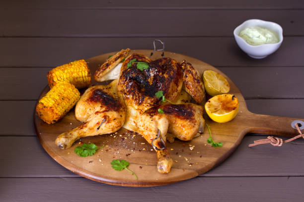 istock Spatchcocked chicken with sweet corn, lime and lemon 1302888025