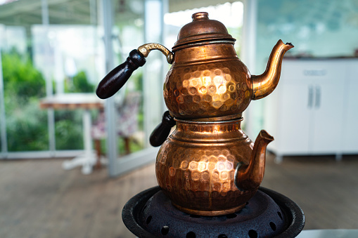 copper teapot ,tea, yellow,