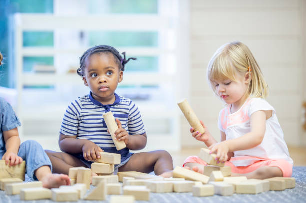 istock Two preschool children playing together 1302891442