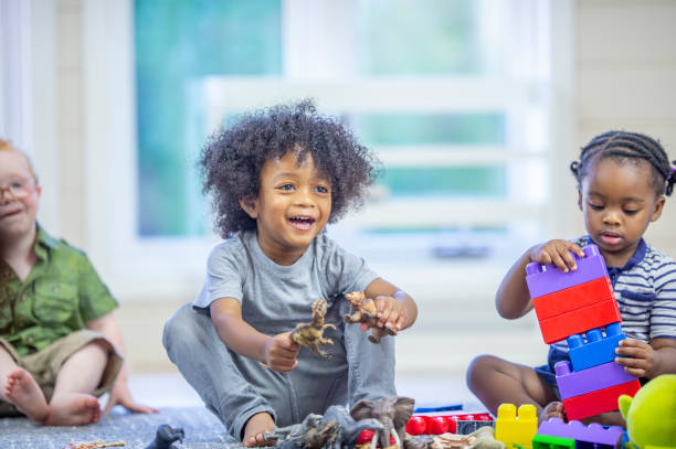 istock Preschool children in a classroom together 1302891445