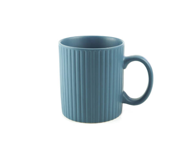 istock Empty blue mug for coffee or tea isolated on white background. 1302894766